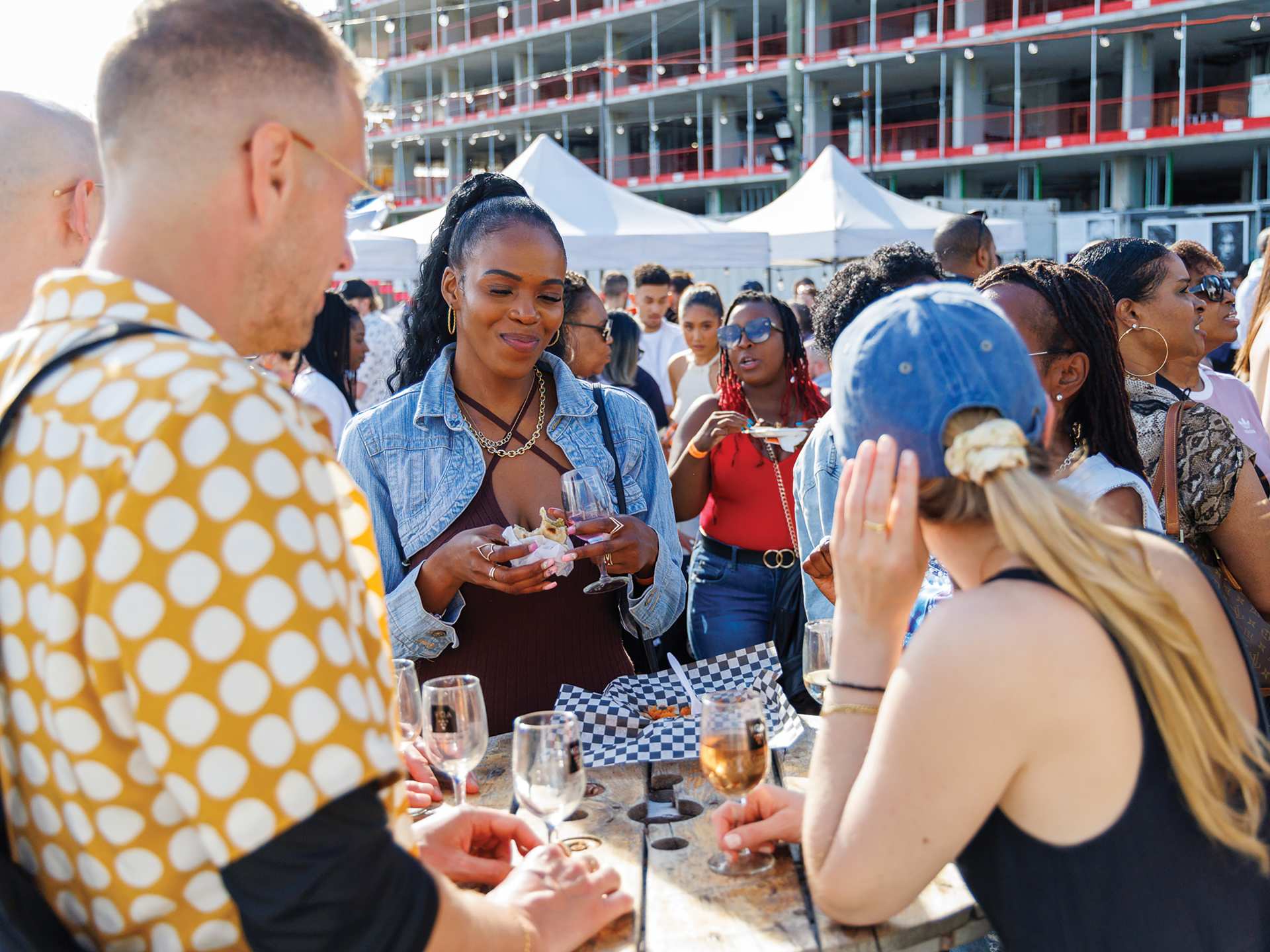 Visitors sample different wines at the Spring Into Spice festival at Stackt Market Visitors sample different wines at the Spring Into Spice festival at Stackt Market