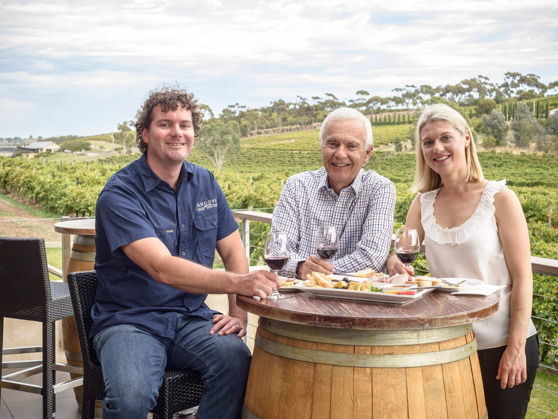 Angove wine | The owners of Angove Family Winemakers sitting around a table Angove wine | The owners of Angove Family Winemakers sitting around a table