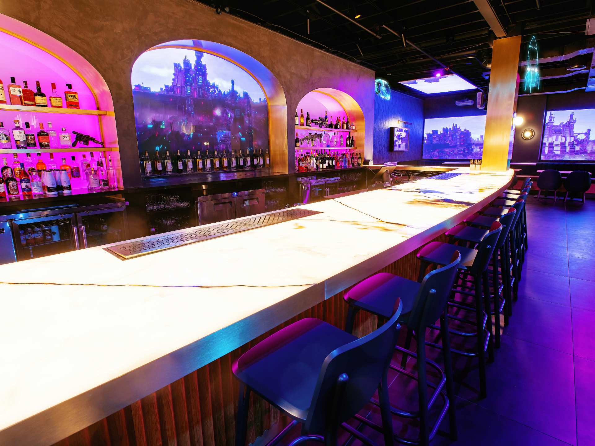 Offworld bar | The bar and purple shelves with liquor at Offworld bar on Queen West Offworld bar | The bar and purple shelves with liquor at Offworld bar on Queen West