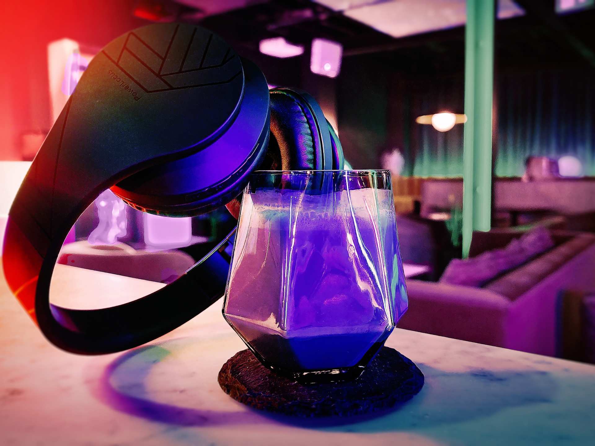 Offworld bar | The Black Hole cocktail with noise cancelling headphones at Offworld bar Offworld bar | The Black Hole cocktail with noise cancelling headphones at Offworld bar