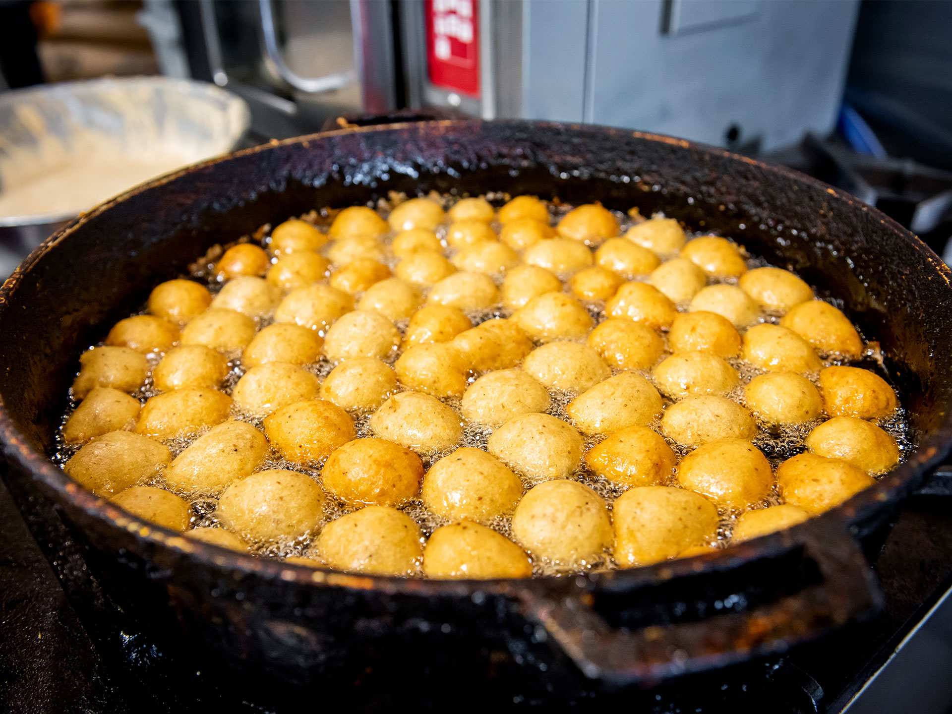 Best Scarborough restaurants | Cooking pholourie at Mona's Roti