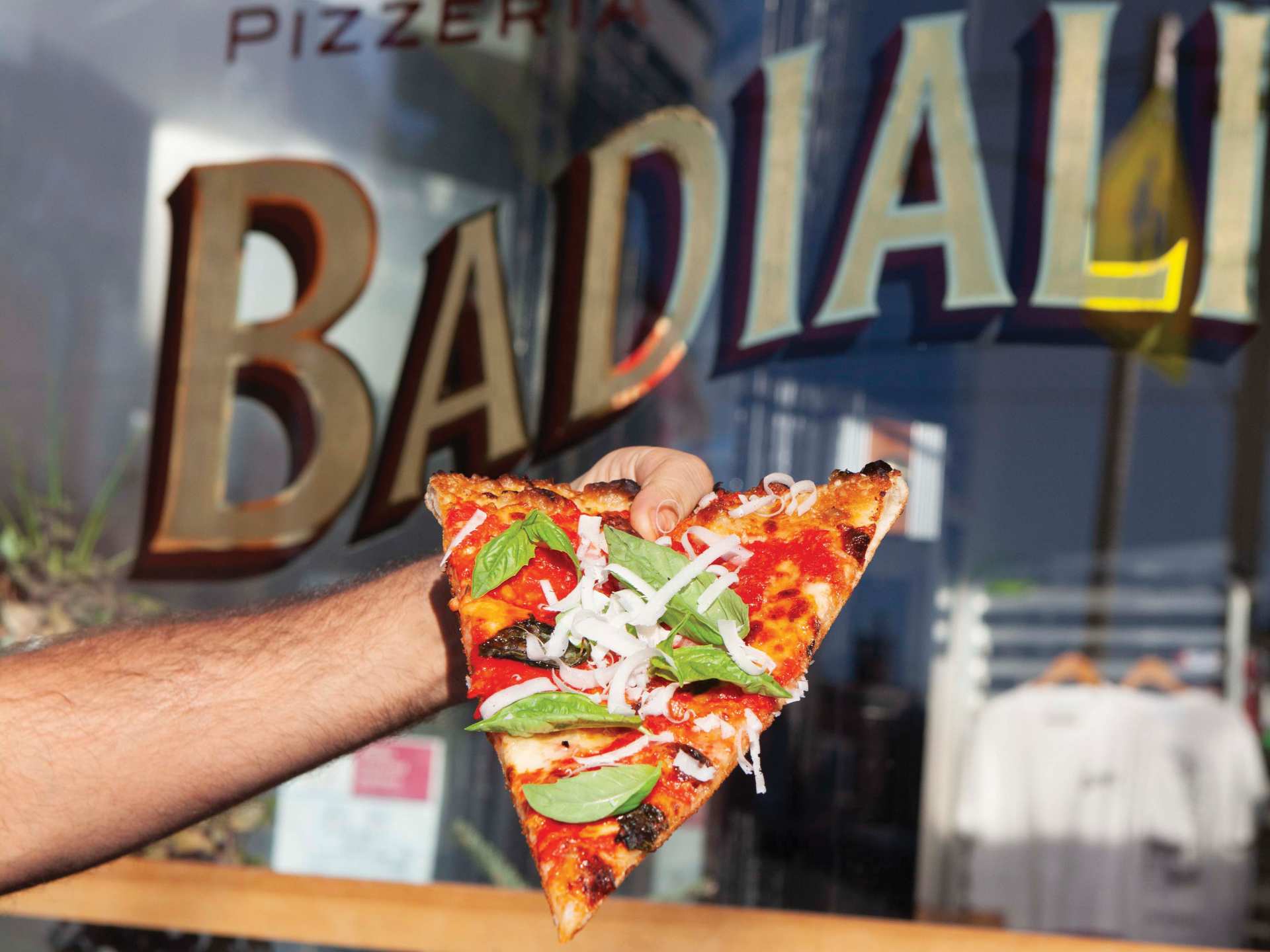A slice of pizza at Pizzeria Badiali A slice of pizza at Pizzeria Badiali