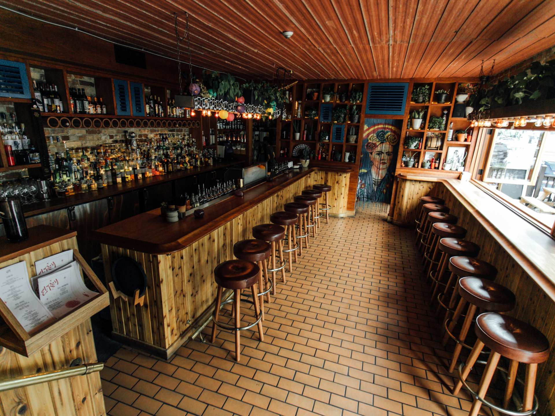 Late night food in Toronto | The dining room with wooden stools at El Rey