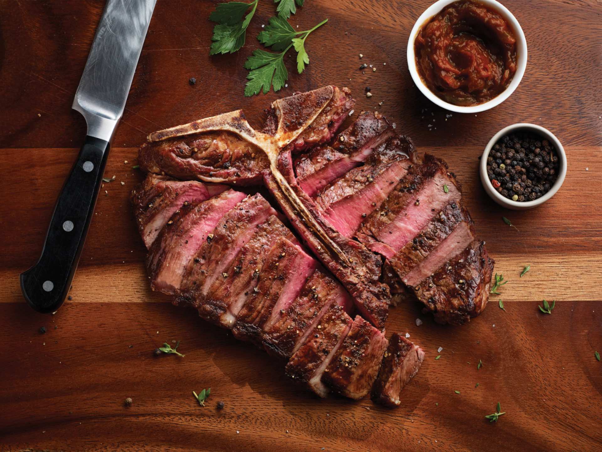 Happy hours in Toronto | A sliced porterhouse steak at Hy's Steakhouse in Toronto