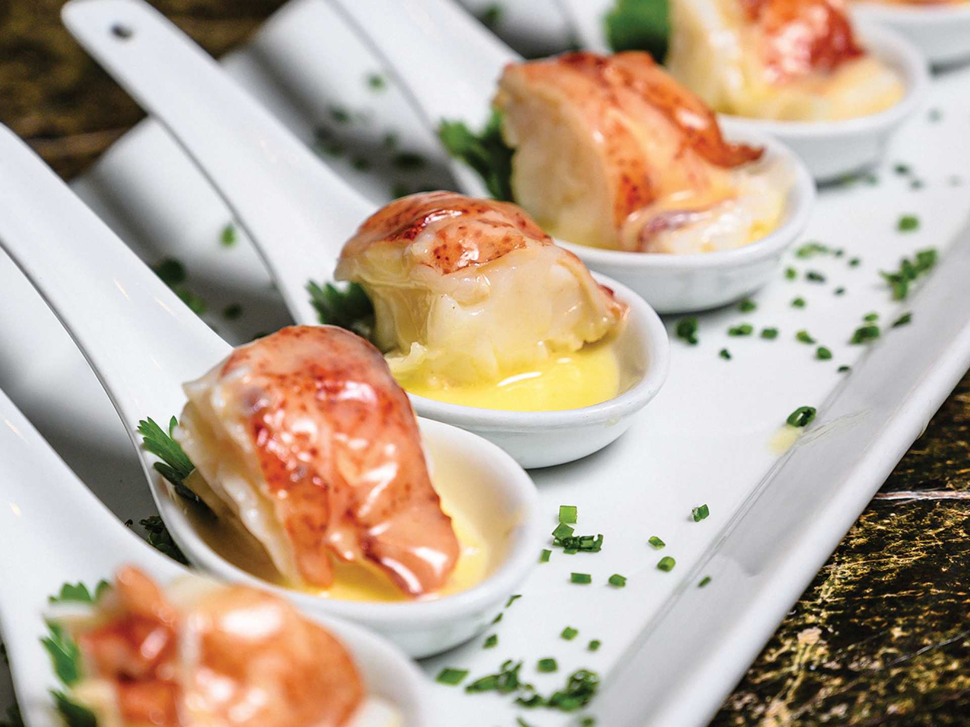 Best patios Toronto | Lobster spoons at ONE Restaurant patio at the Hazelton Hotel