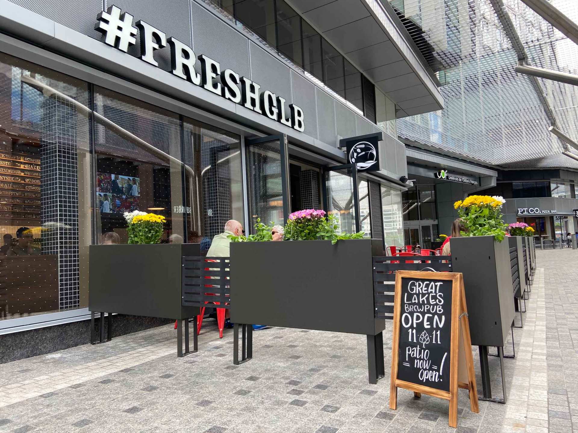 Best breweries in Toronto | The patio at Great Lakes Brewpub with guests sitting outside