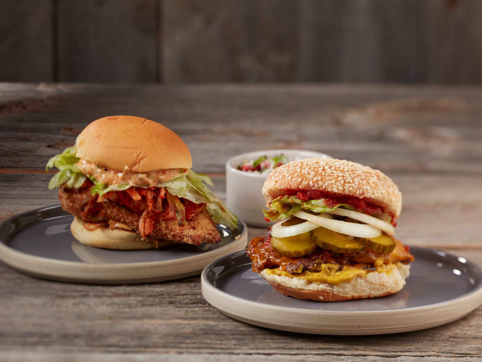 Best breweries in Toronto | Two stacked burgers on plates at Great Lakes Brewery