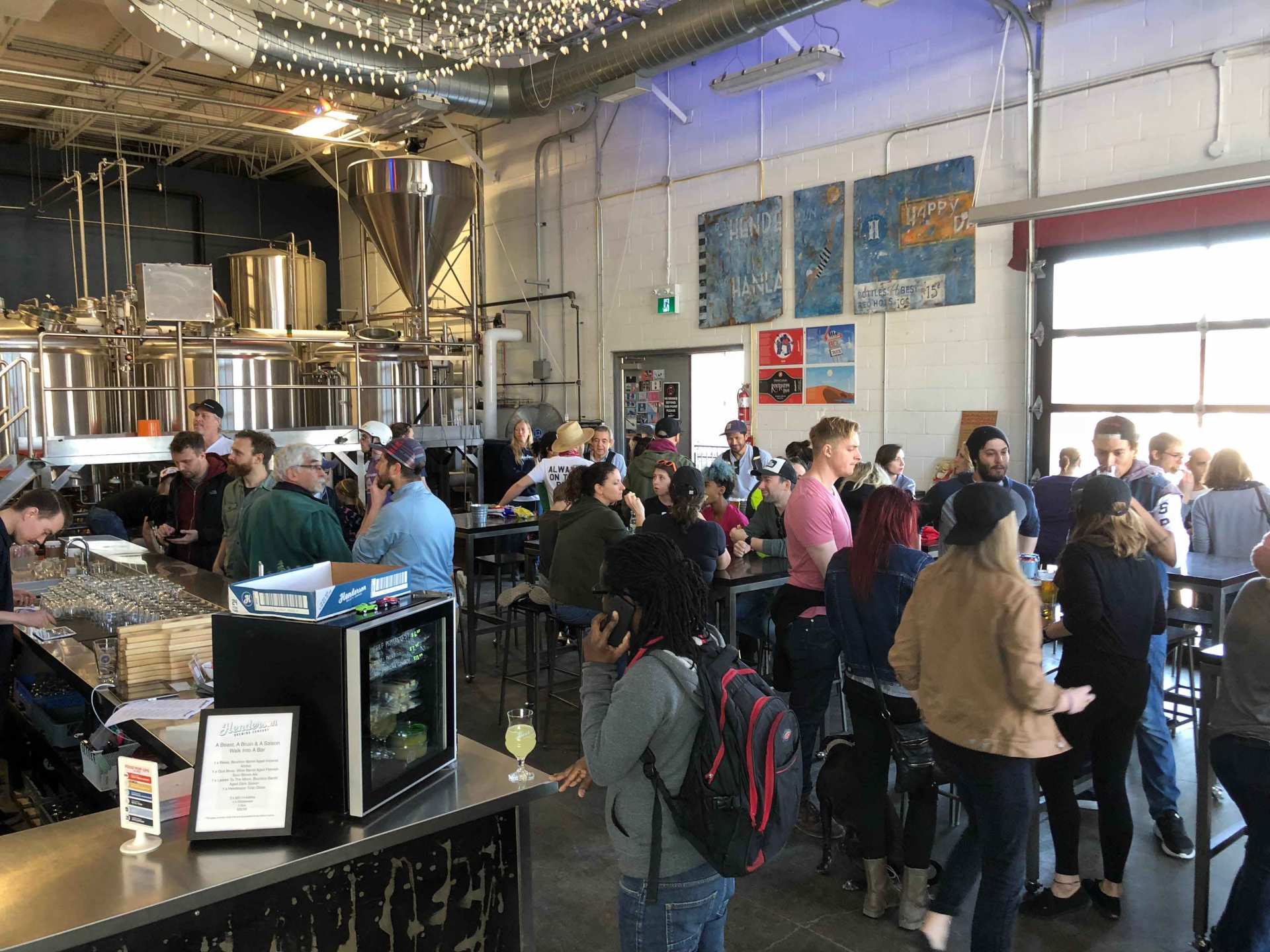 Best breweries in Toronto | Crowds inside Henderson Brewing Co. in Toronto
