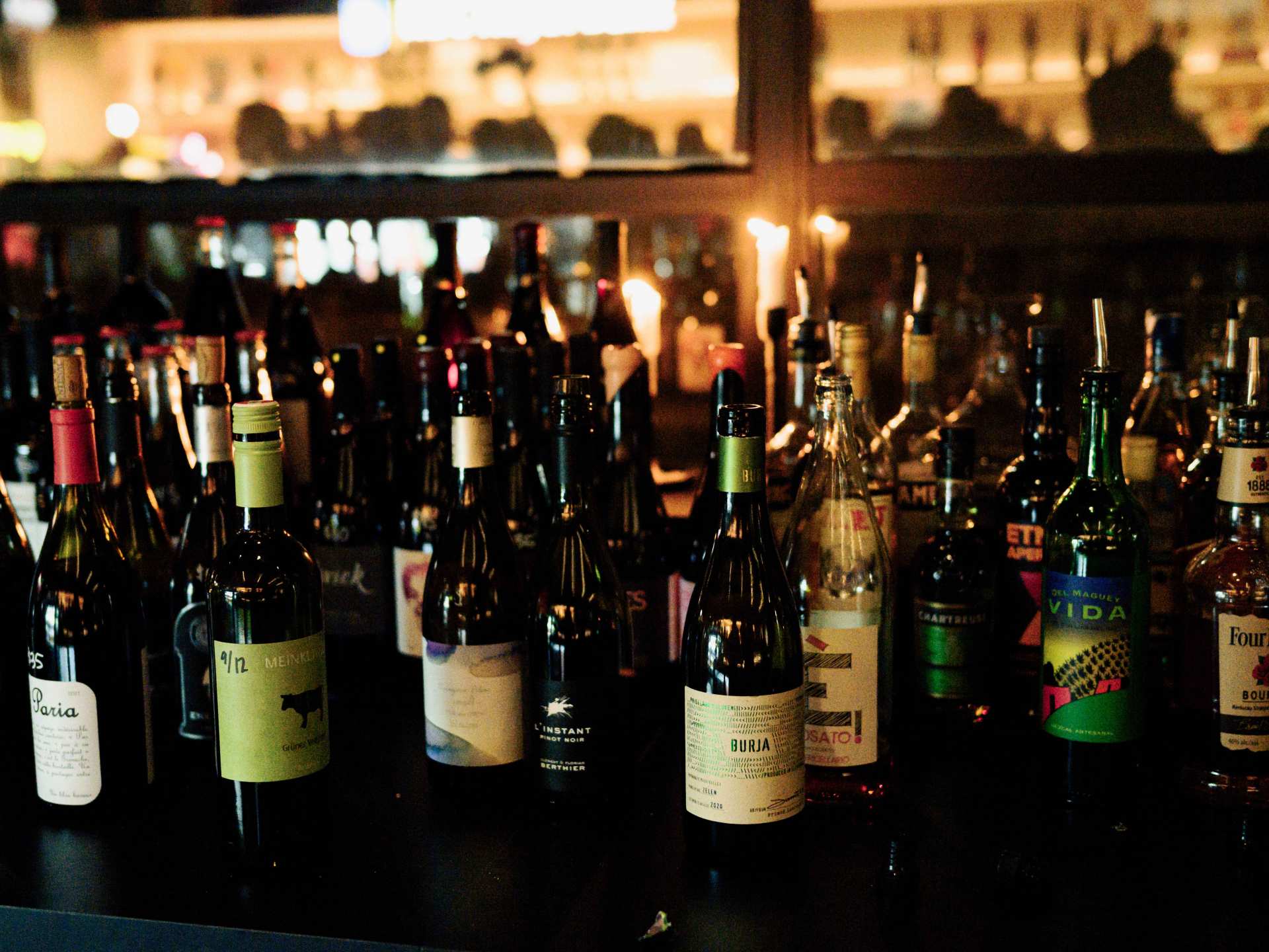 The Daughter Toronto | Bottles of wine on the bar at The Daughter in Toronto The Daughter Toronto | Bottles of wine on the bar at The Daughter in Toronto