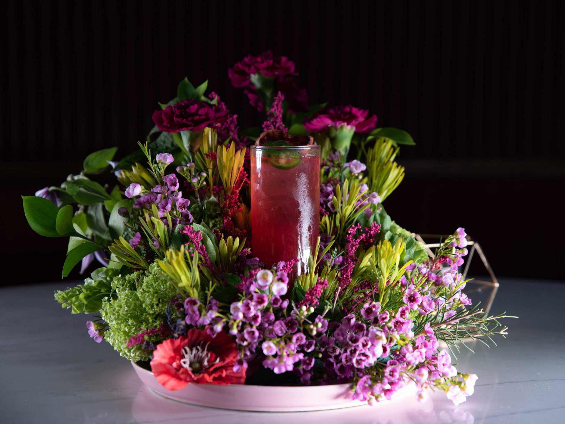 Best cocktail bars in Toronto | A magenta-hued cocktail at Daisy