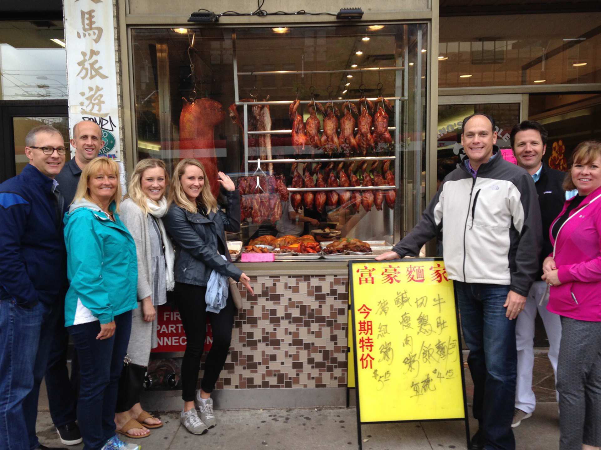 A group of Culinary Adventure Co. tour members standing outside of King's Noodle A group of Culinary Adventure Co. tour members standing outside of King's Noodle