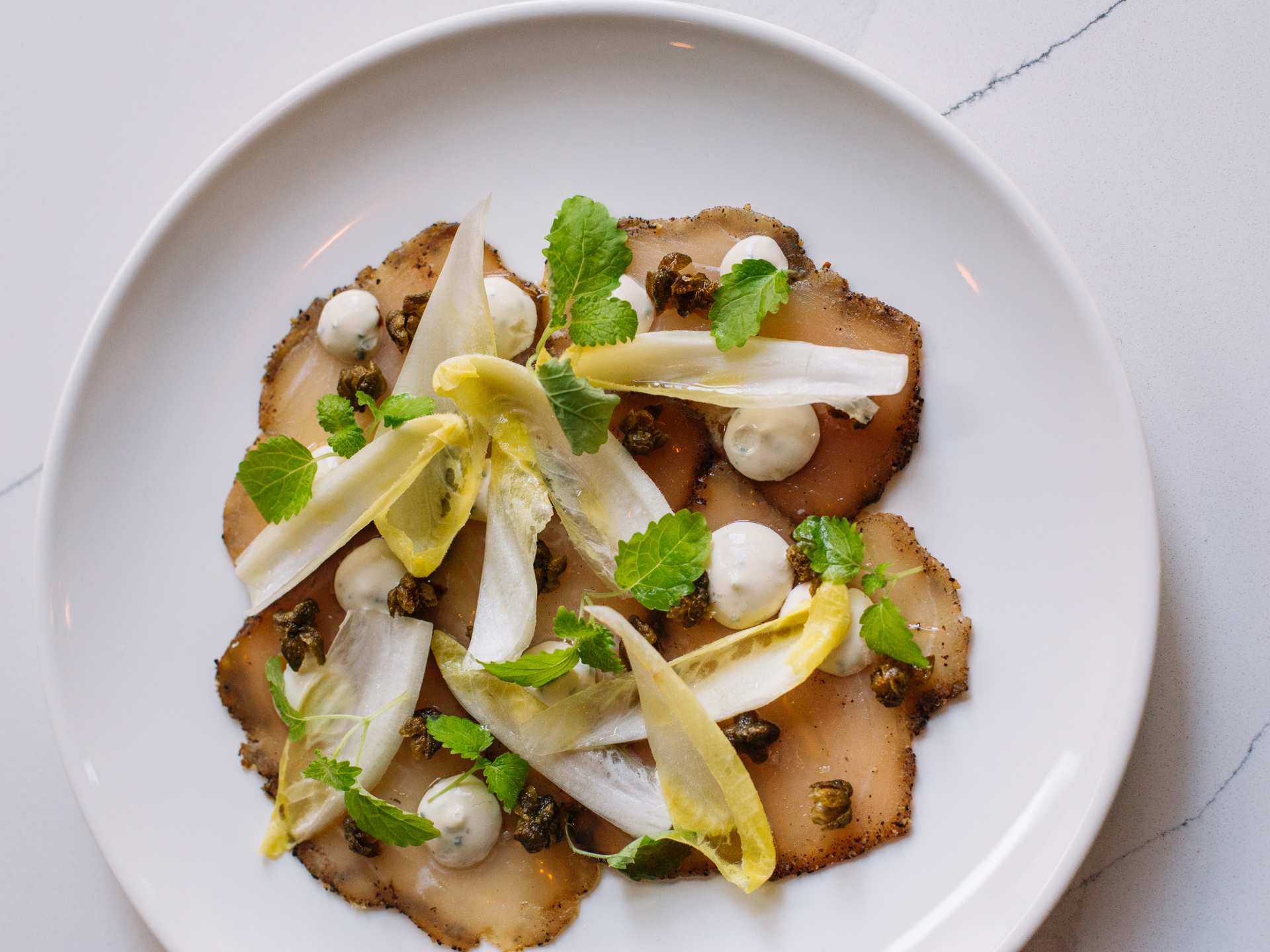 Best new restaurants in Toronto | Tuna carpaccio at Contrada restaurant in Toronto