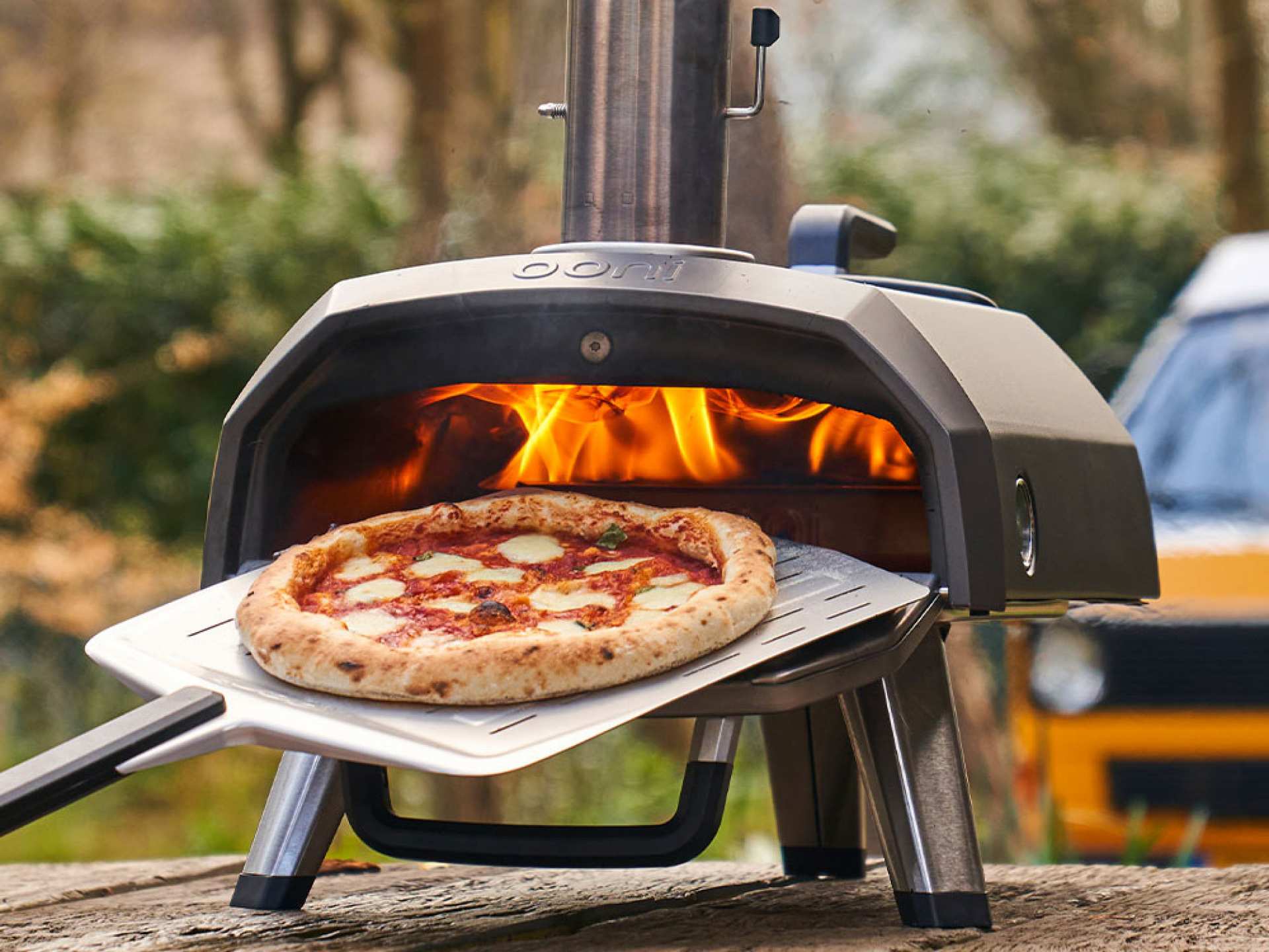 Taking a pizza out of the Ooni Karu 12G pizza oven Taking a pizza out of the Ooni Karu 12G pizza oven