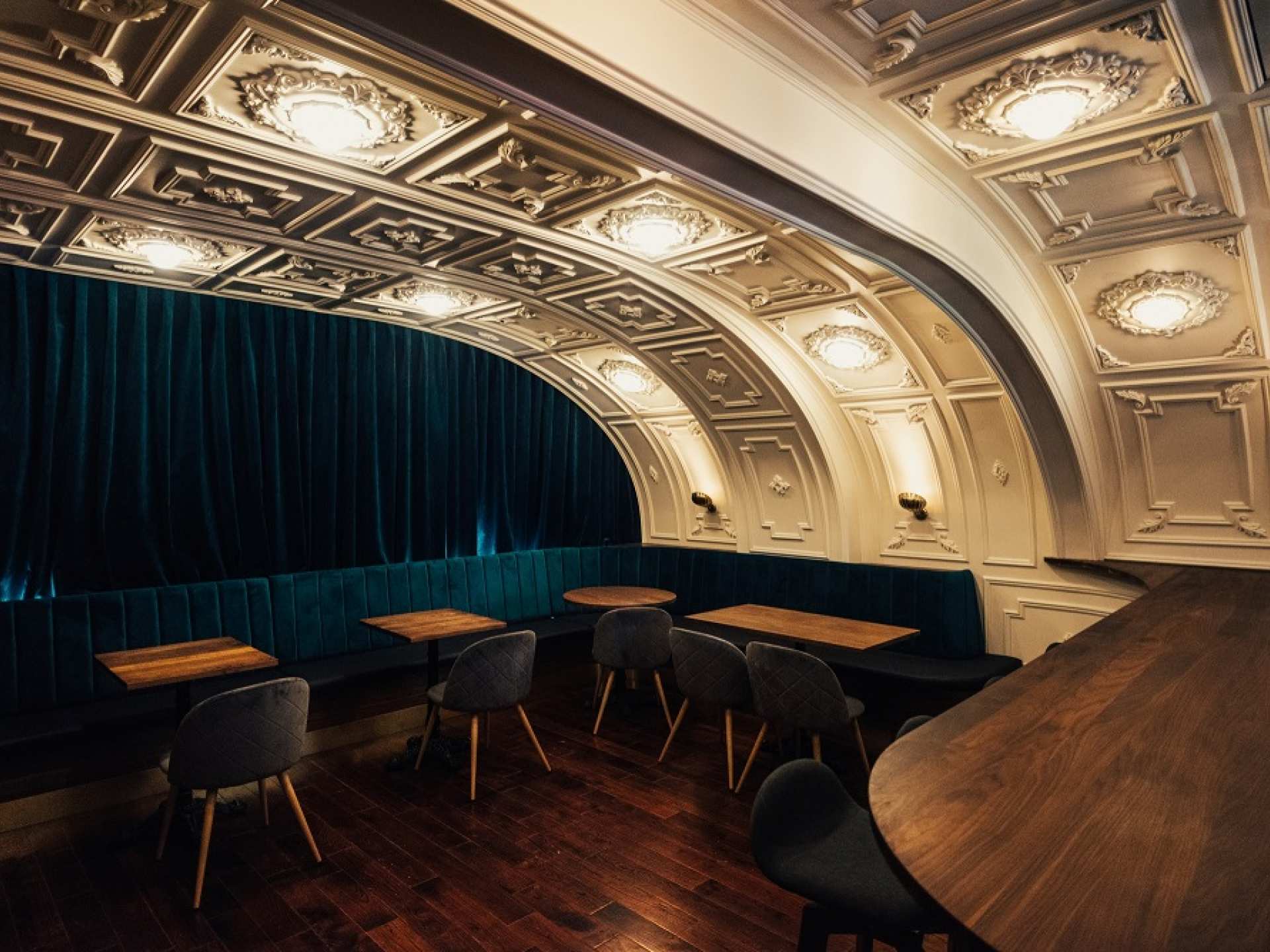 The best vegan restaurants in Toronto | The table and lush blue curtain at Bar Avelo