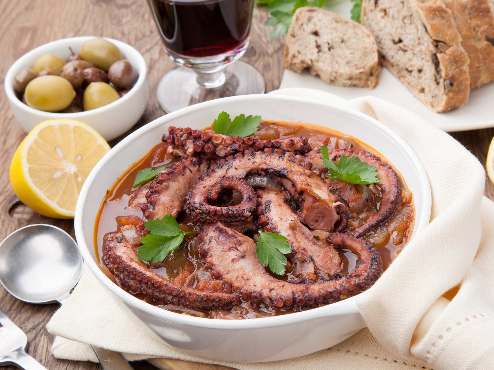 Polvo guisado with assorted sides Polvo guisado with assorted sides