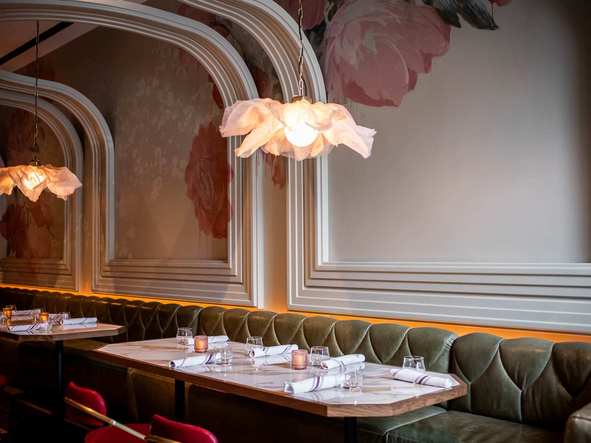 The best downtown Toronto restaurants | Plush green sofas at La Plume in The Well