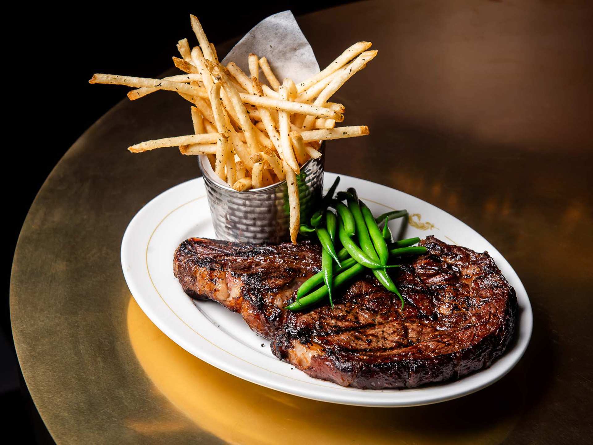 The best downtown Toronto restaurants | Ribeye steak with frites at La Plume
