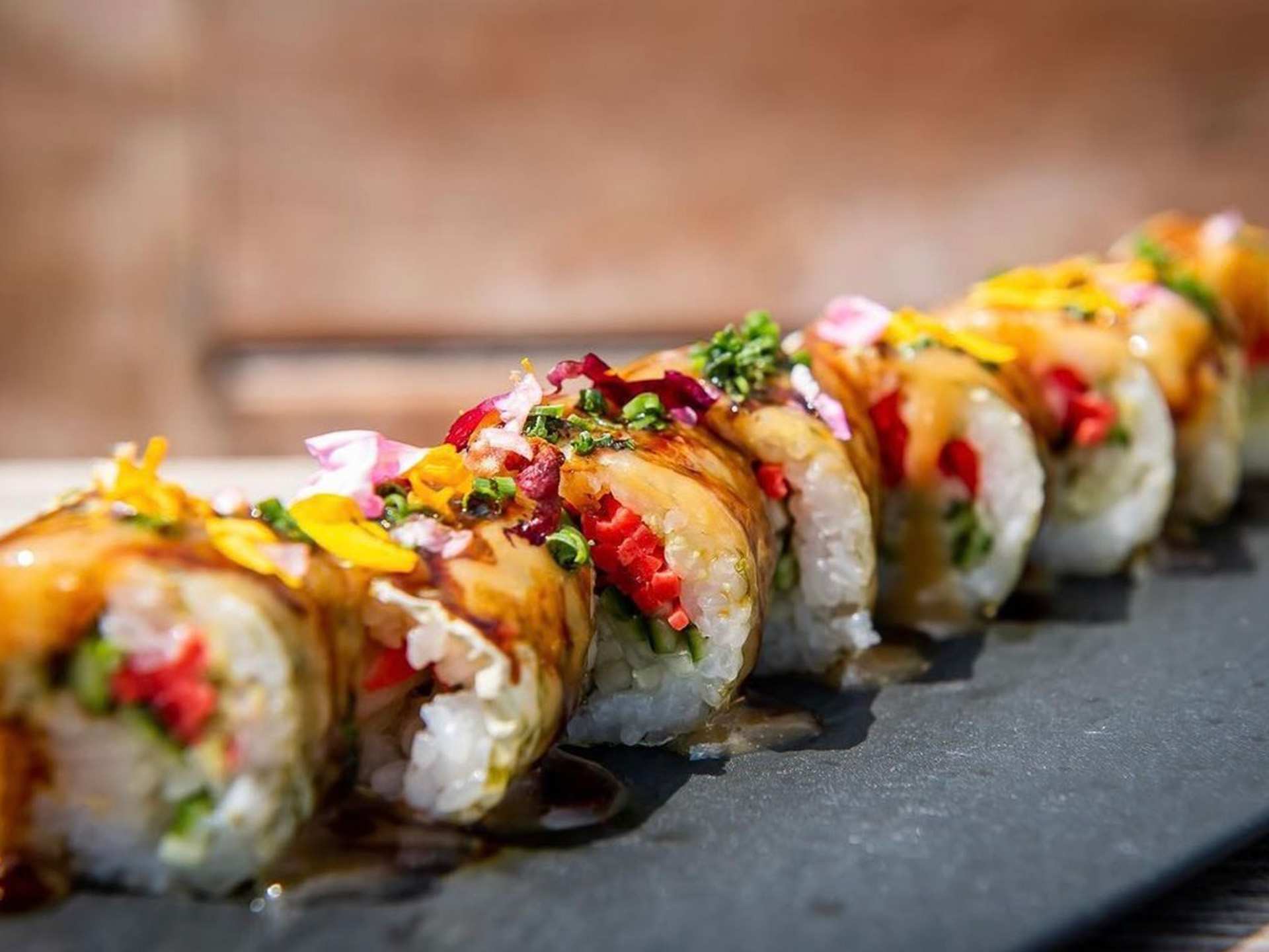 The best downtown Toronto restaurants | Hamachi tiger rolls at Harriet's Rooftop