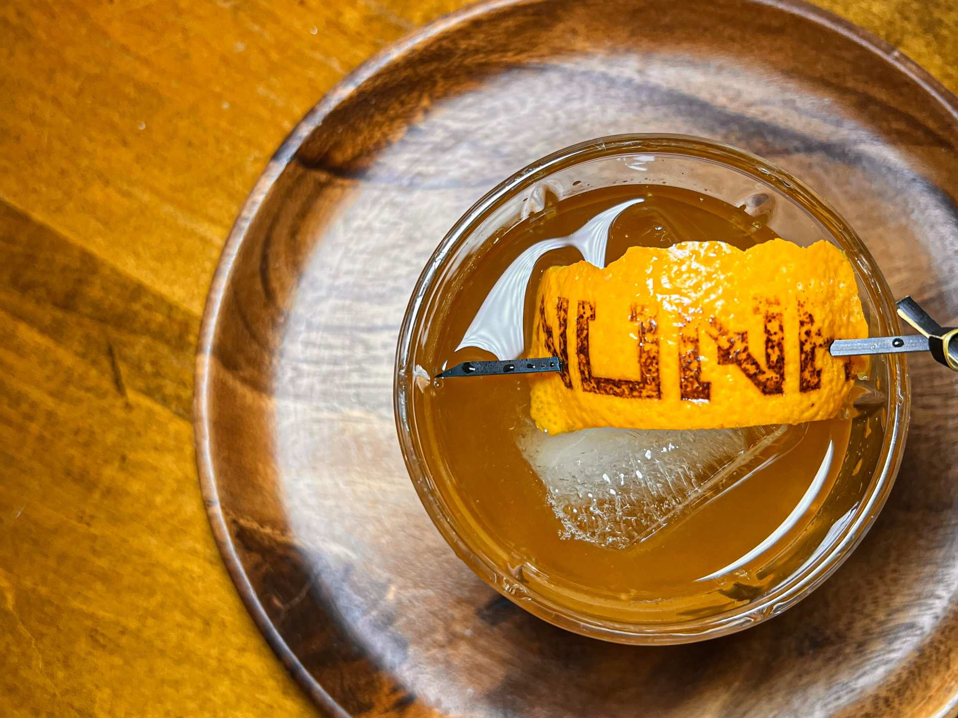 Summerlicious Toronto | Nuna is charred into an orange peel on a cocktail