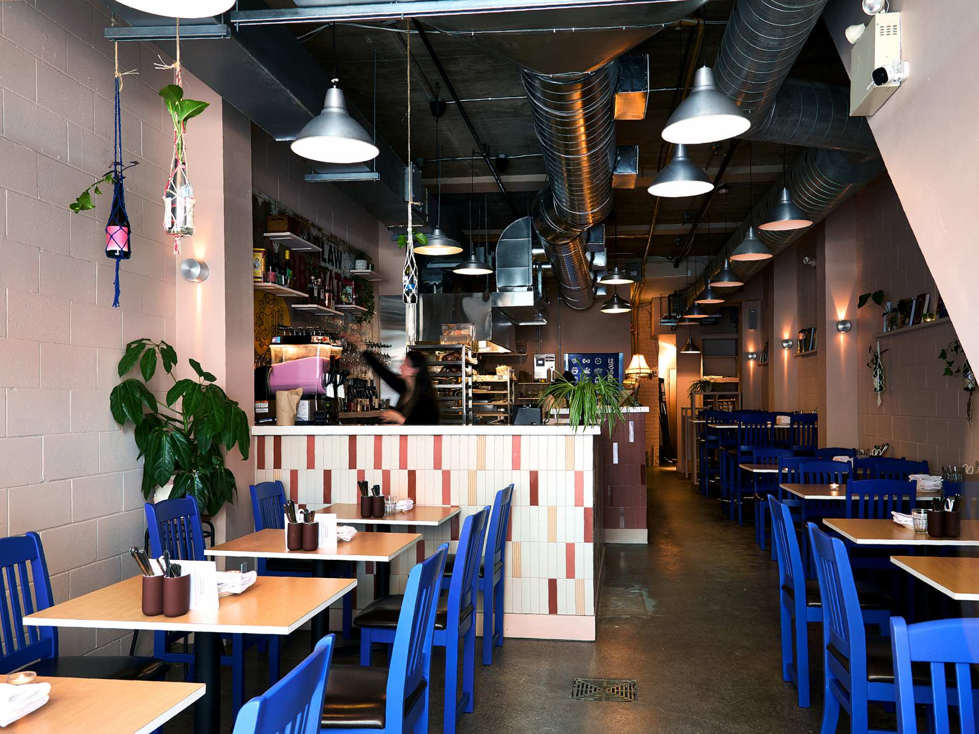 Toronto bottle shops and alcohol stores | The dining room at Ricky + Olivia, where chef Ricky Casipe serves nostalgic dishes