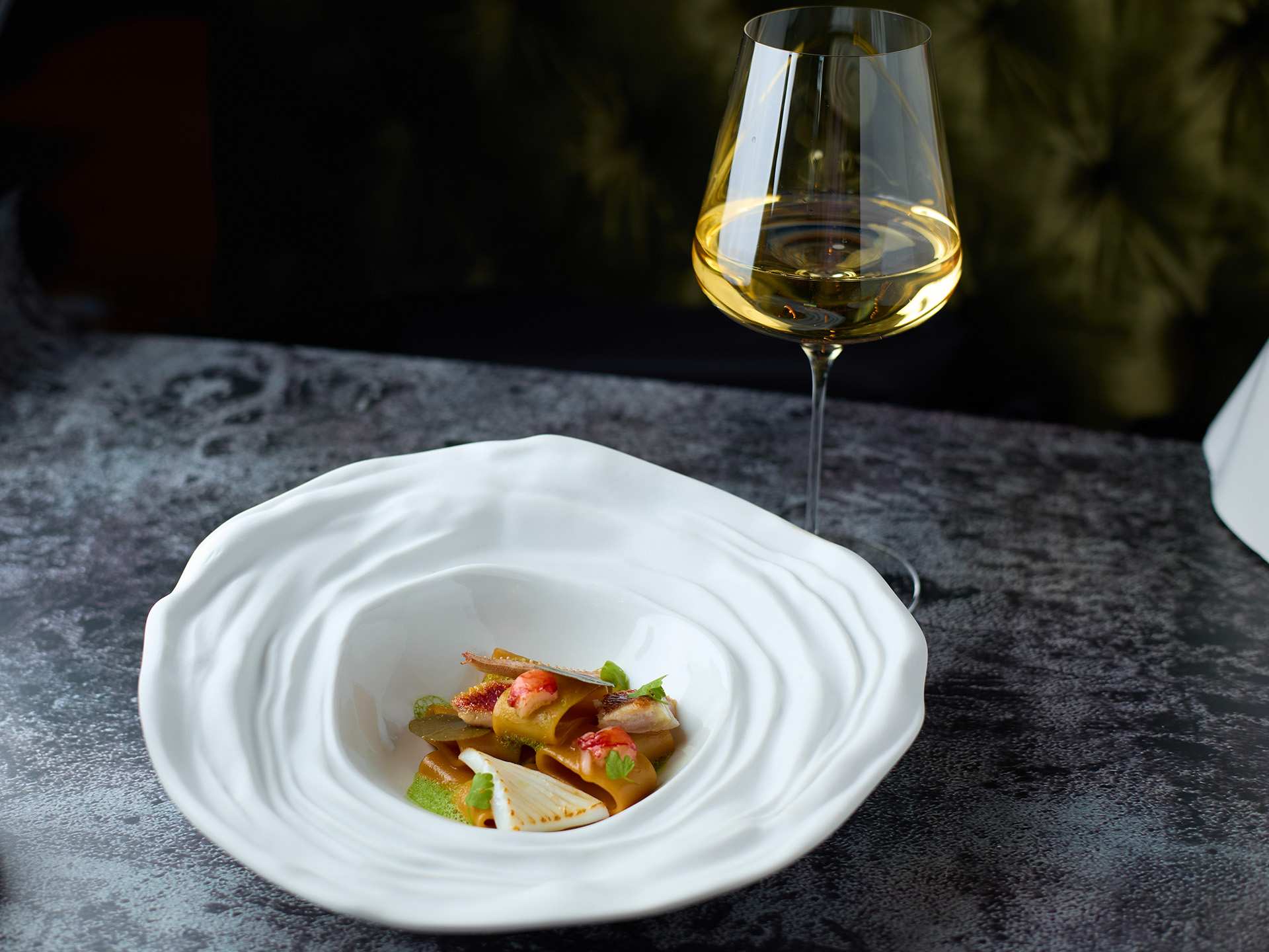Best Italian restaurants in Toronto | A pasta dish at DaNico with a glass of white wine