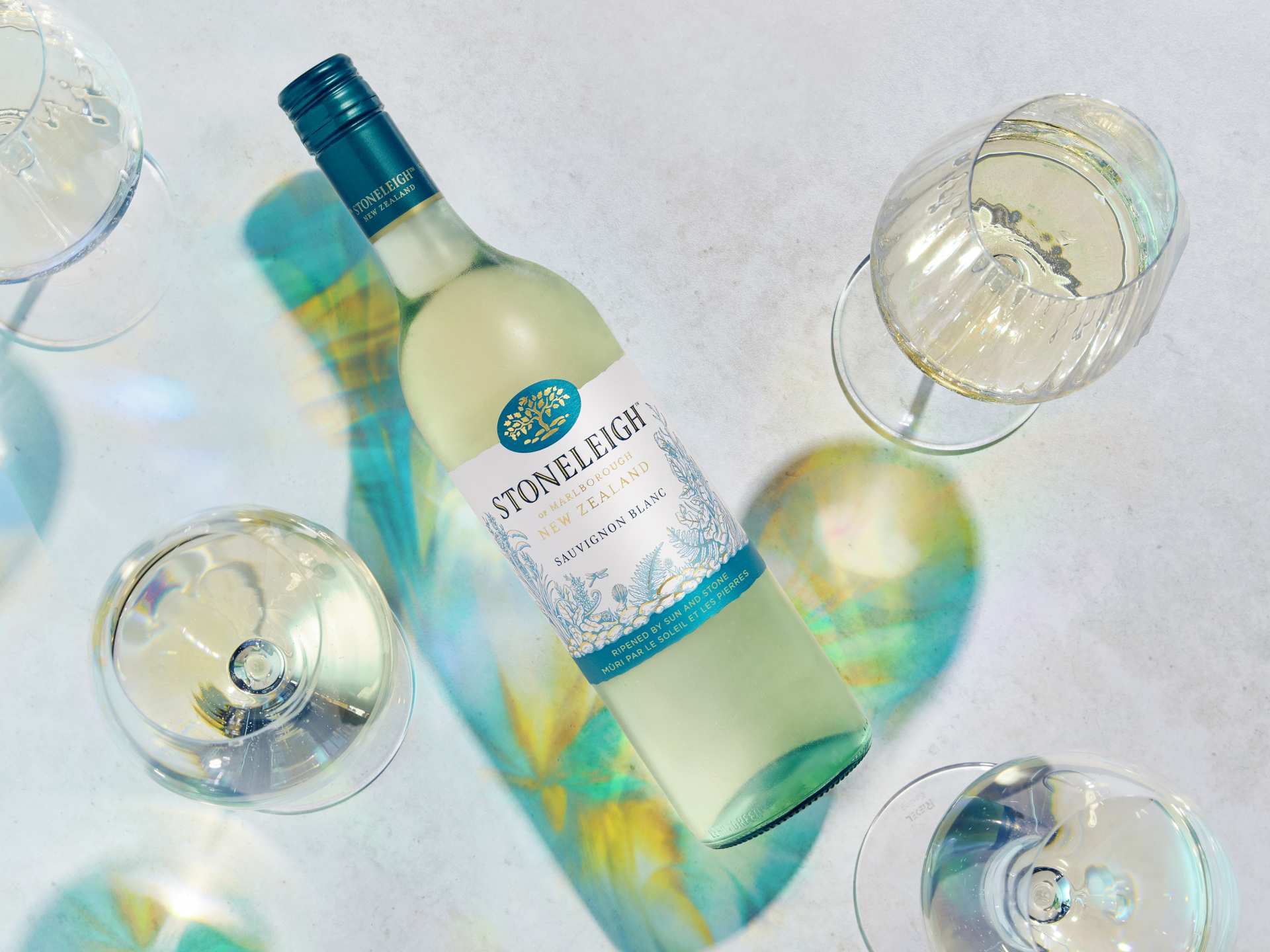 A bottle of Stoneleigh with glasses