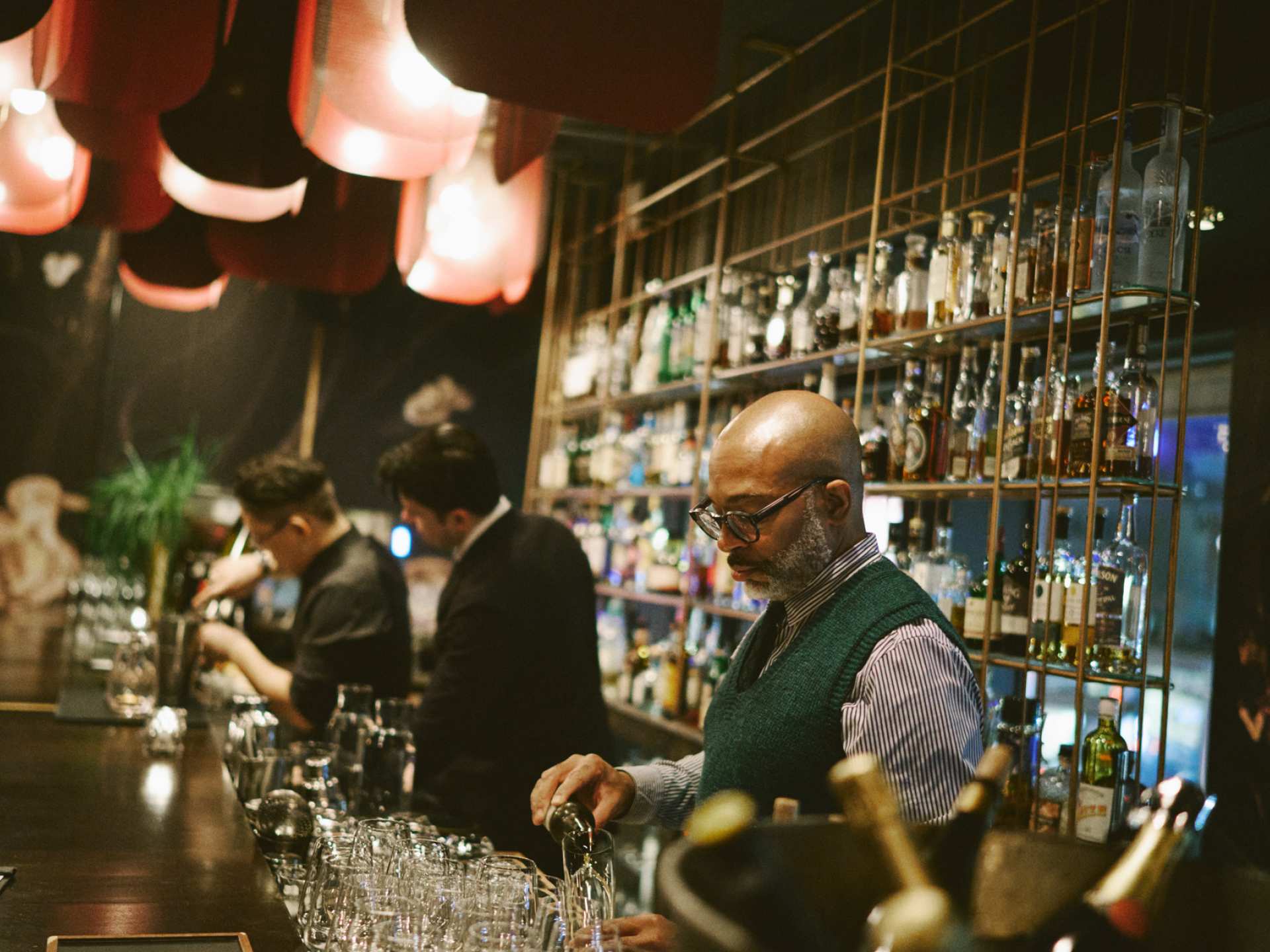 Visa Infinite Dining Series | Sommelier Christopher Sealy pours wine at the Alo Visa Infinite Dining Series