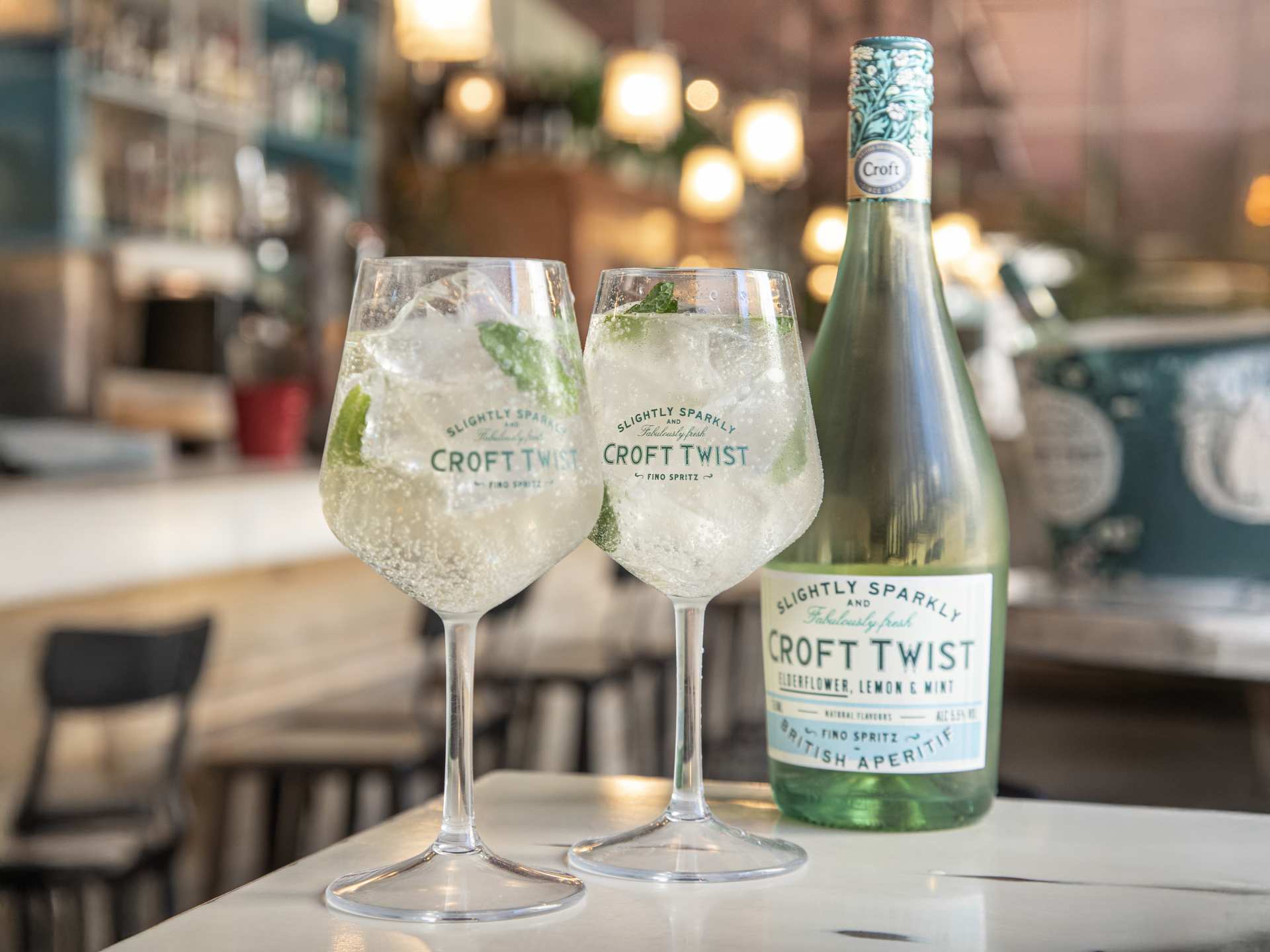 Two glasses and a bottle of Croft Twist
