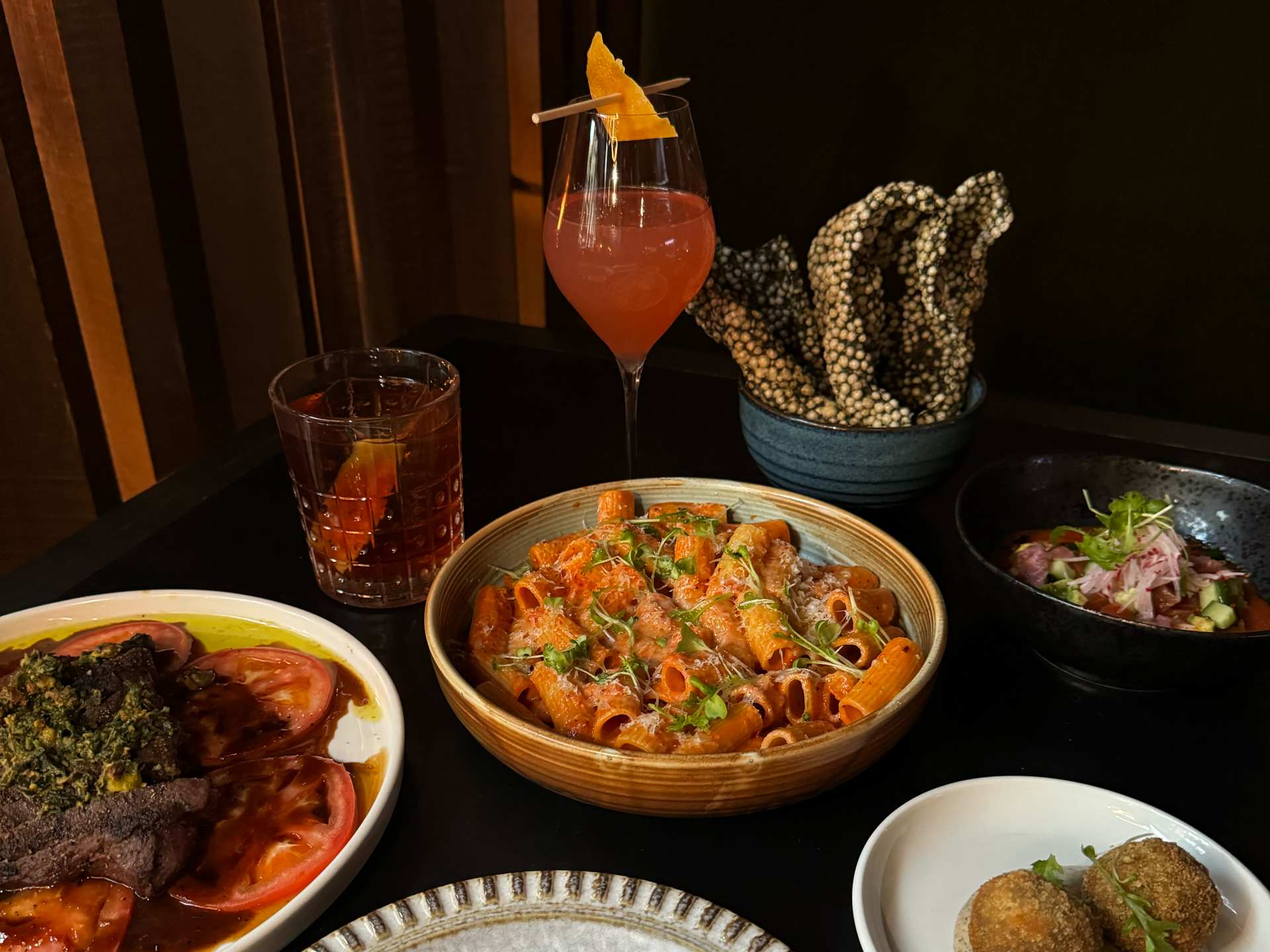 A spread of dishes at Runway06