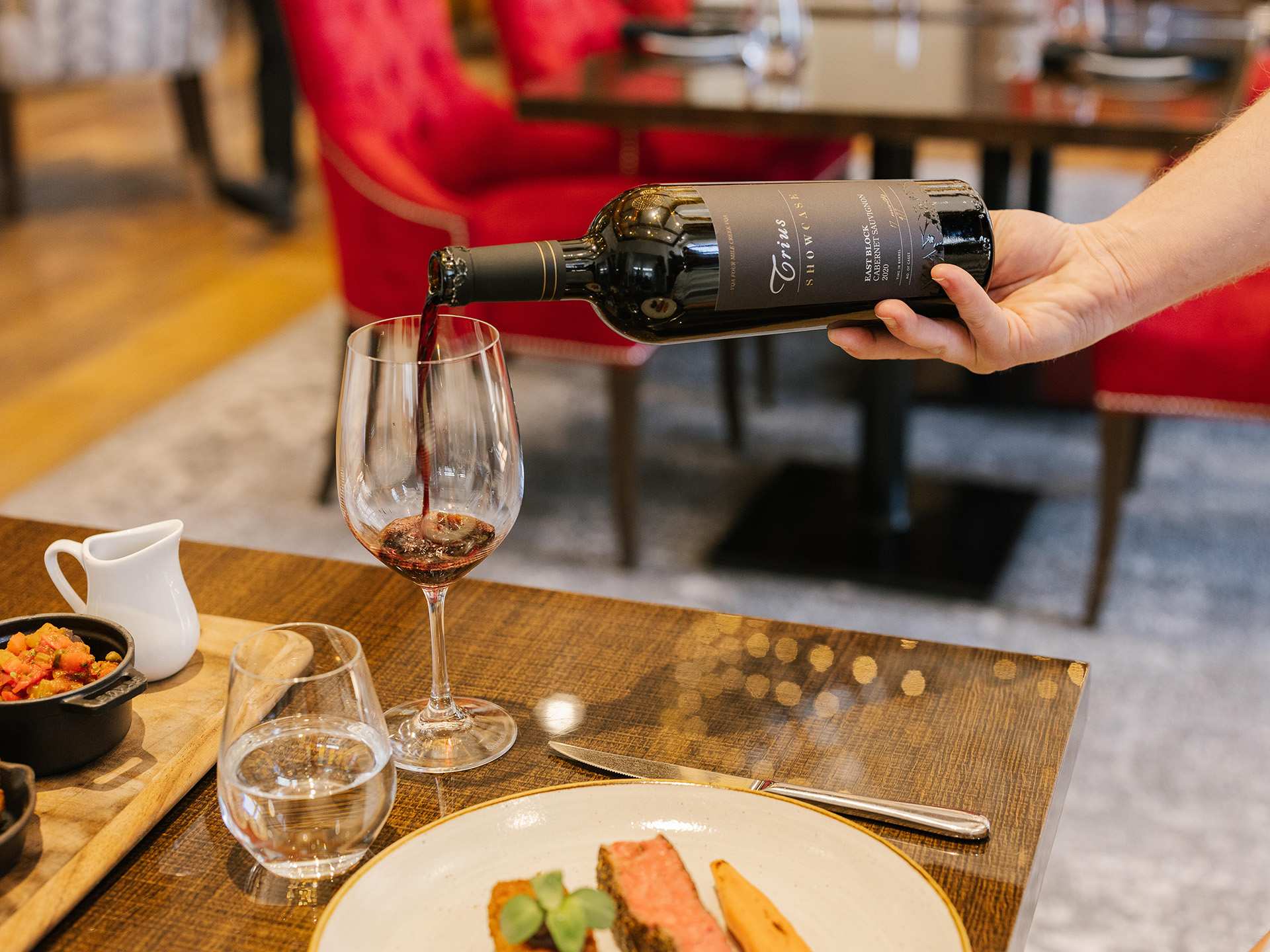 Pouring a glass of wine at Trius Winery and Restaurant