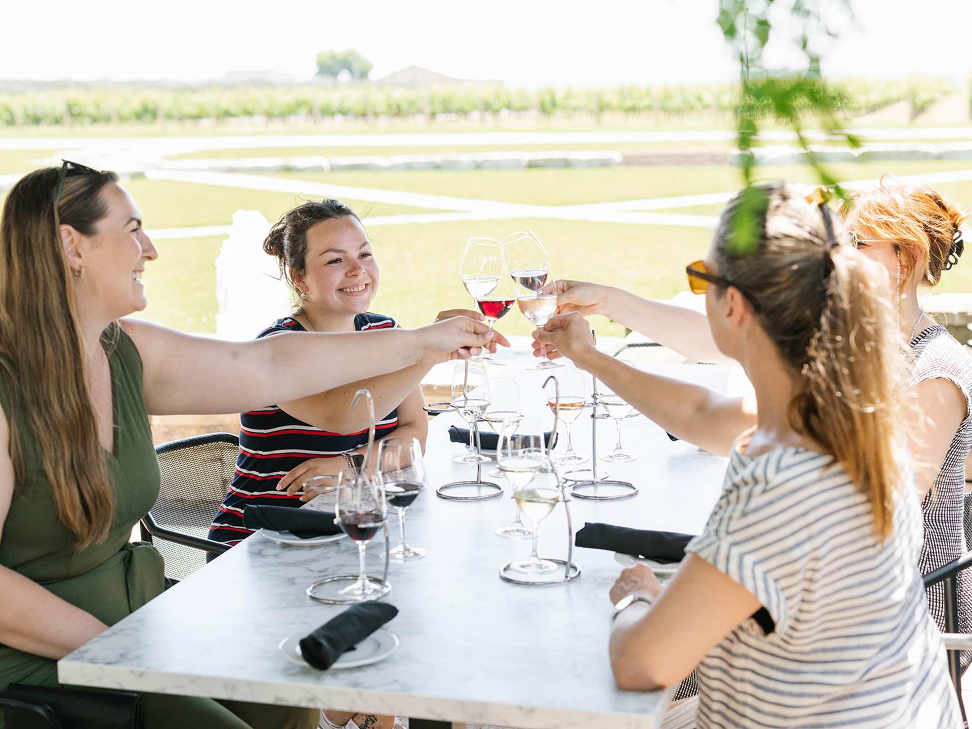 A group of people enjoying wine at Trius Winery Restaurant