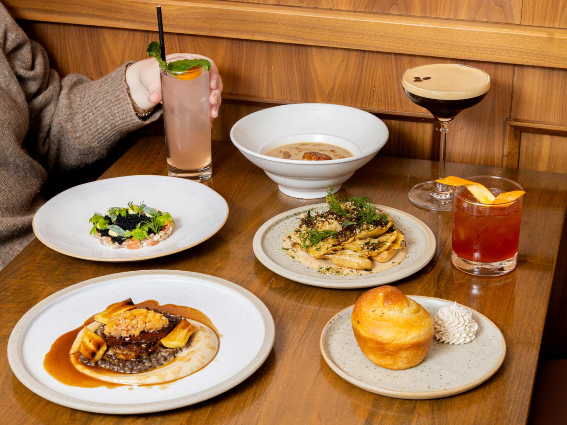 Romantic Restaurants | A spread of food and drink at The Rosebud