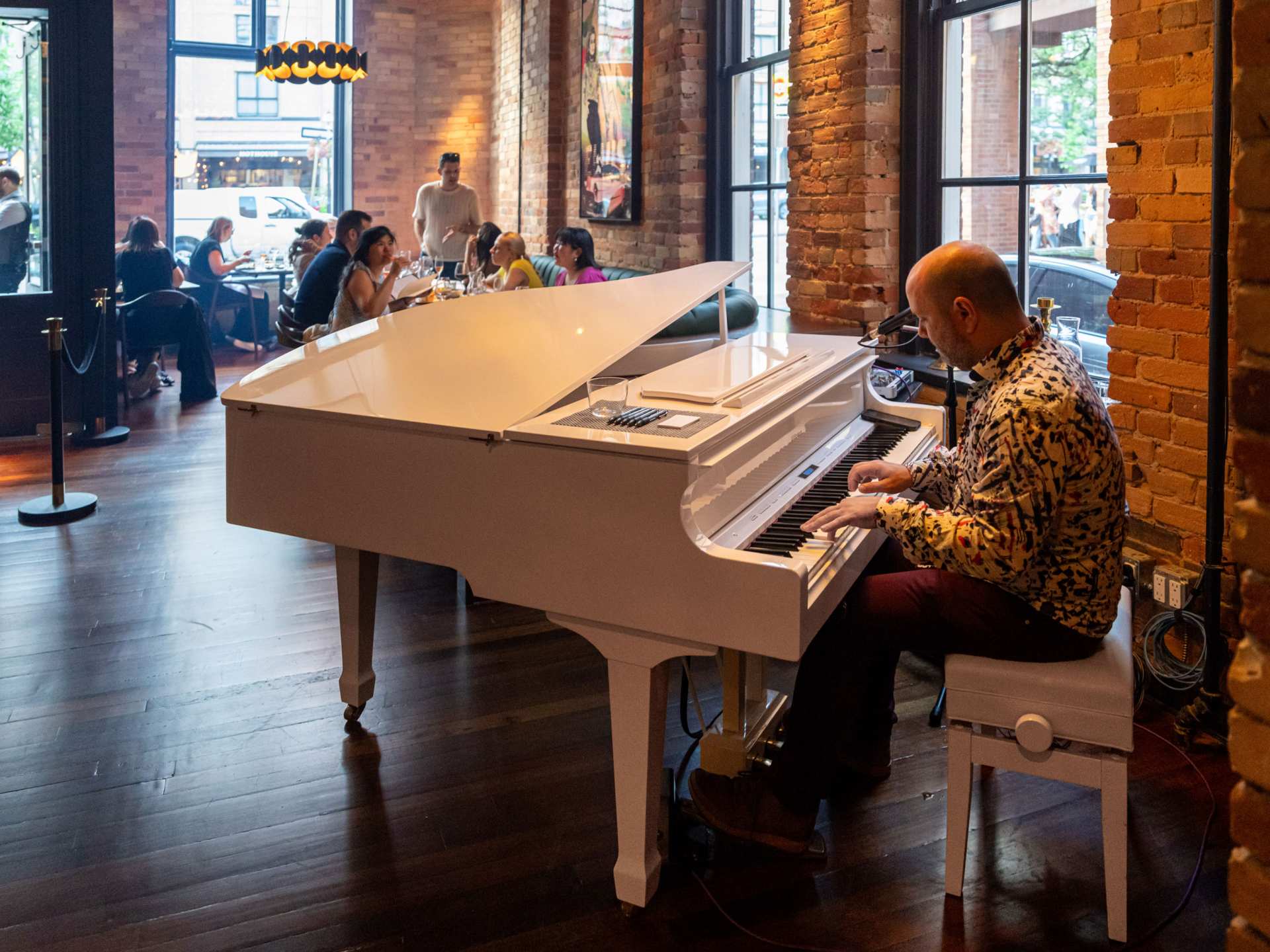 The best restaurants in Toronto | A pianist plays in the bar at The Berczy Tavern