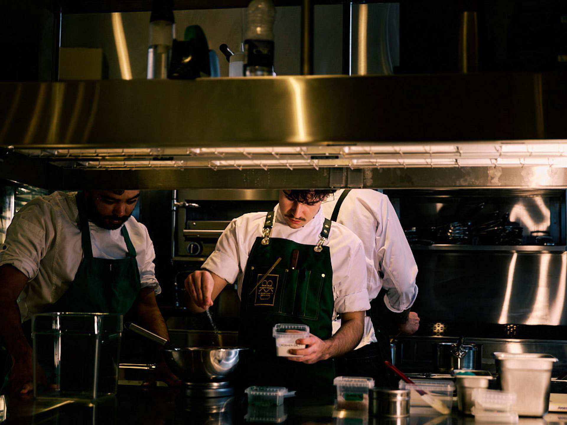 The best restaurants in Toronto | Chefs prepping at the pass at Akin Toronto