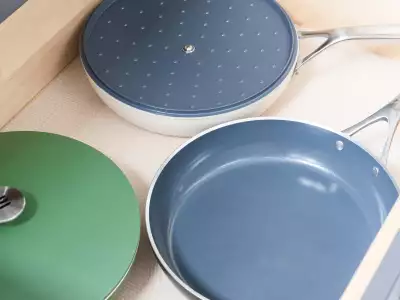 Kilne Everything Pan stacked in kitchen cupboard