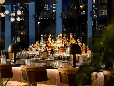 Happy Hour Toronto | The well-lit bar and alcohol bottles at Casa Madera