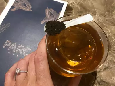 The Sazerac vintage reserve cocktail topped with Kaluga Gold Caviar