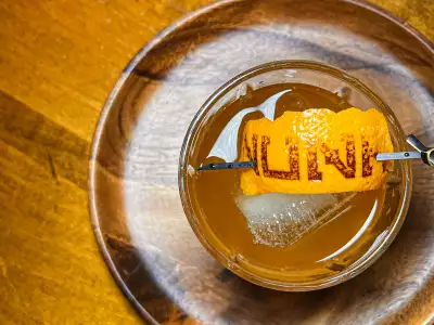 Summerlicious Toronto | Nuna is charred into an orange peel on a cocktail