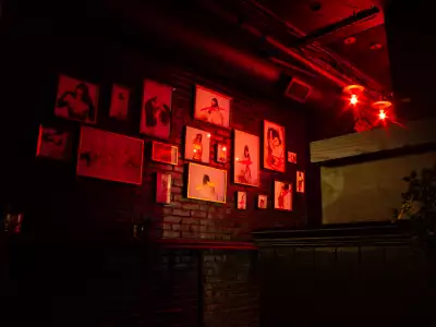 Best new Toronto restaurants | A photo wall at Baby's Cabaret