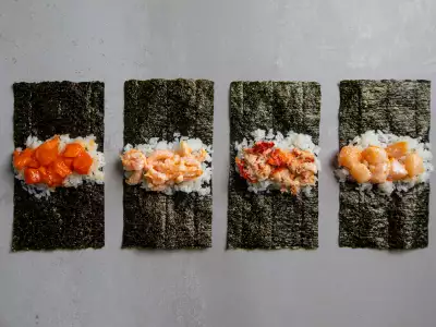 Hello Nori the Hand Roll Bar, Toronto | Four handrolls lay unwrapped at Hello Nori