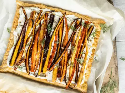 Harissa and maple roasted carrot tart with carrot-top dill cream cheese