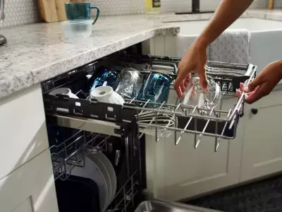 Loading Maytag's Top Control Dishwasher with Dual Power Filtration
