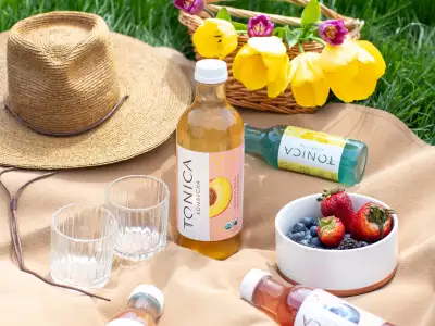 Bottles of Tonica Kombucha at a picnic