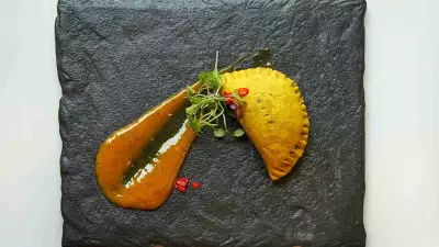 Alcohol delivery in Toronto | a Jamaican patty at Northern Maverick brewery, bottleshop and restaurant