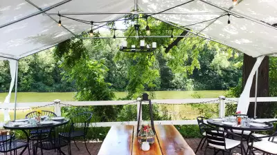 The patio overlooking the Grand River at La Fontana, one of the best Elora restaurants