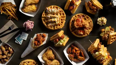 Best Southern soul food restaurants Toronto | a spread of fried chicken and waffles from the Dirty Bird