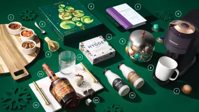Food and drink holiday Christmas gifts | A flat lay of holiday-themed gifts