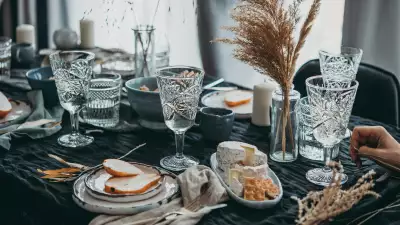 Dinner party and restaurant etiquette examples | A beautiful table setting with crystal glasses