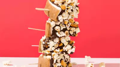 National Popcorn Day January 19 | Popcorn-coated cheesecake on a stick