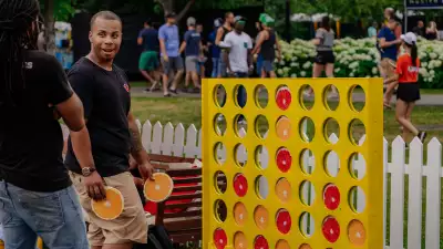 People play lawn games at Fizz Fest